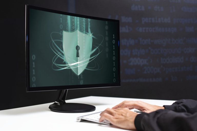 hacker-cracking-binary-code-data-security-scaled